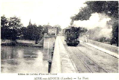 Steam tram passing over the bridge at Aire-sur-Adour